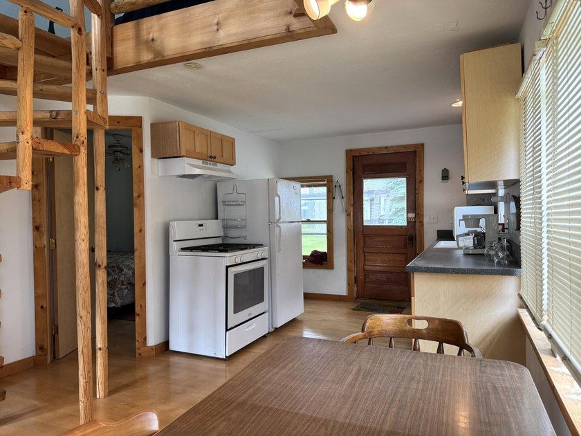 Enjoy 150' of shared sandy lakefront on beautiful Houghton - photo 12