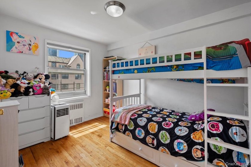 Fabulous top floor 2 bedroom unit close to the new bustling - photo 13