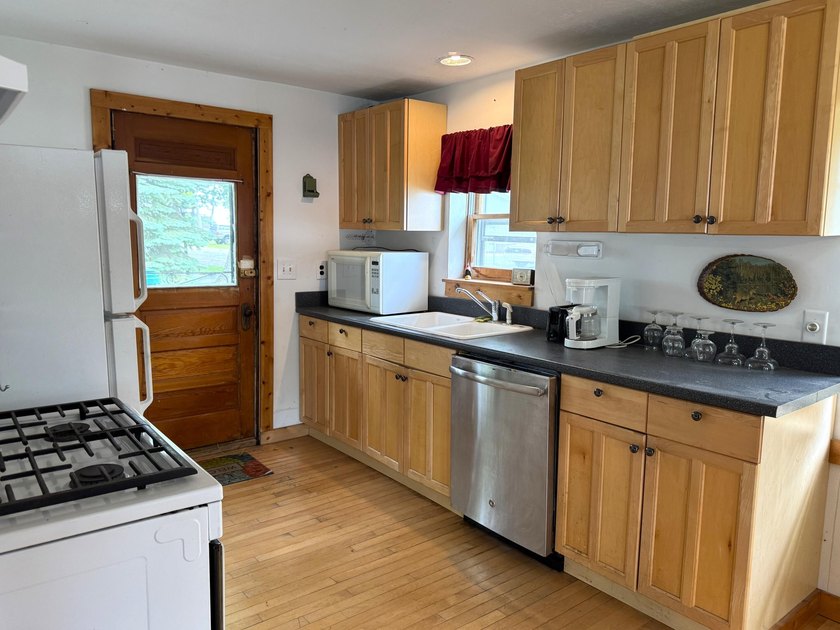 Enjoy 150' of shared sandy lakefront on beautiful Houghton - photo 13