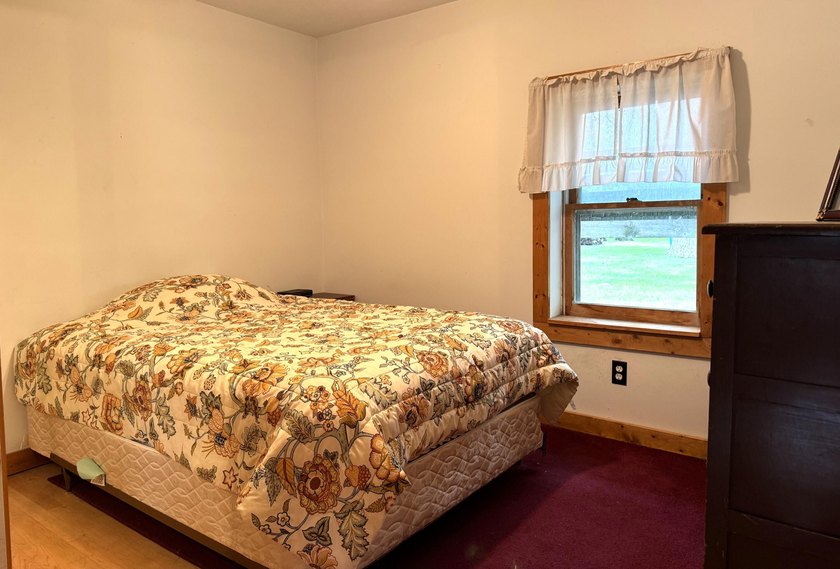 Enjoy 150' of shared sandy lakefront on beautiful Houghton - photo 15
