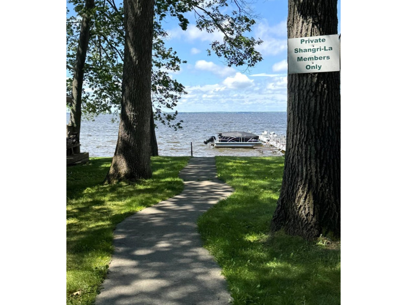 Enjoy 150' of shared sandy lakefront on beautiful Houghton - photo 28