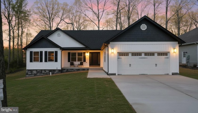 Nestled in the prestigious Lake of the Woods community, this - photo 2