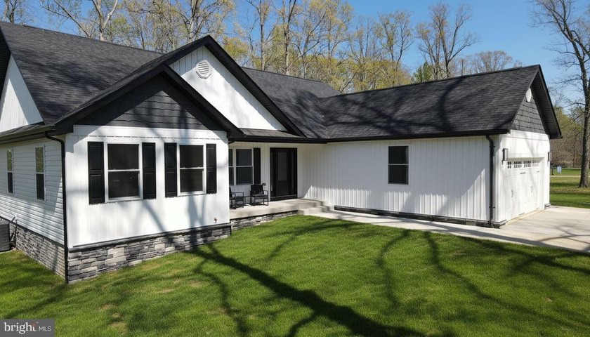 Nestled in the prestigious Lake of the Woods community, this - photo 4