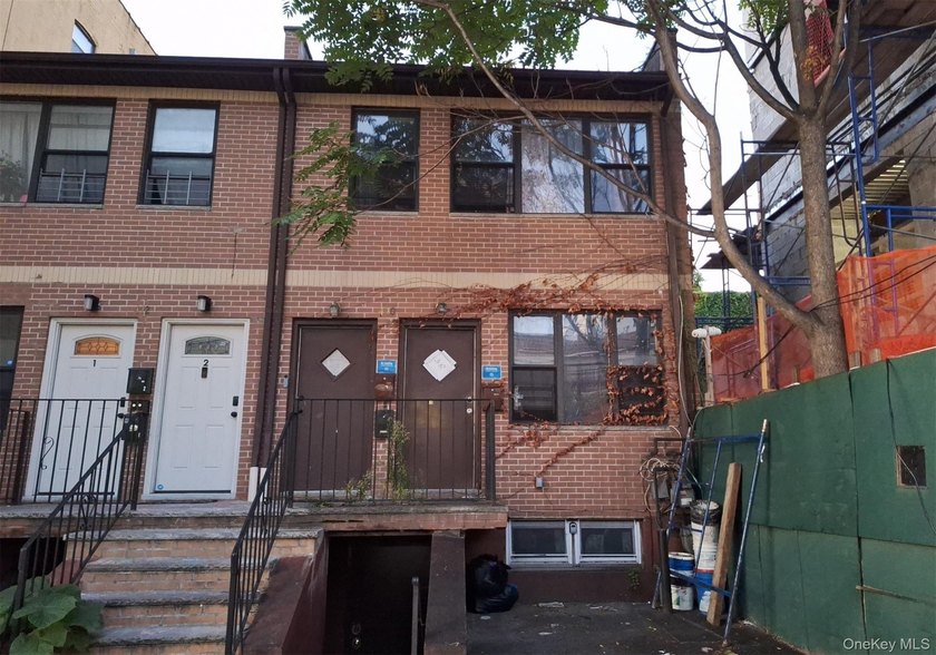 This Duplex Style Home Features 5 Bedrooms, 2 Full Baths and - photo 2