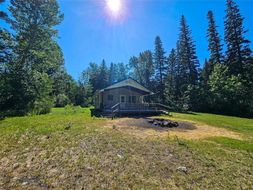 Experience authentic Montana living on the banks of the renowned - photo 8