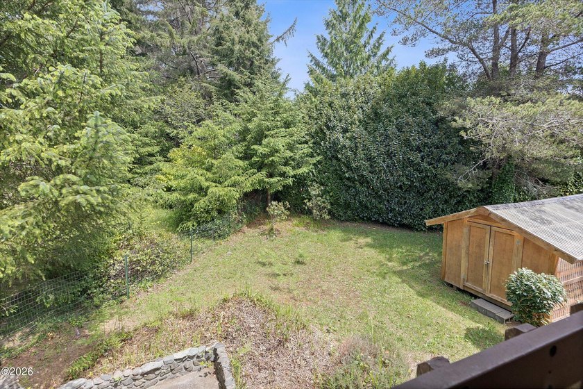 CHARMING COASTAL HOME! This 2,320 square foot home is located on - photo 32