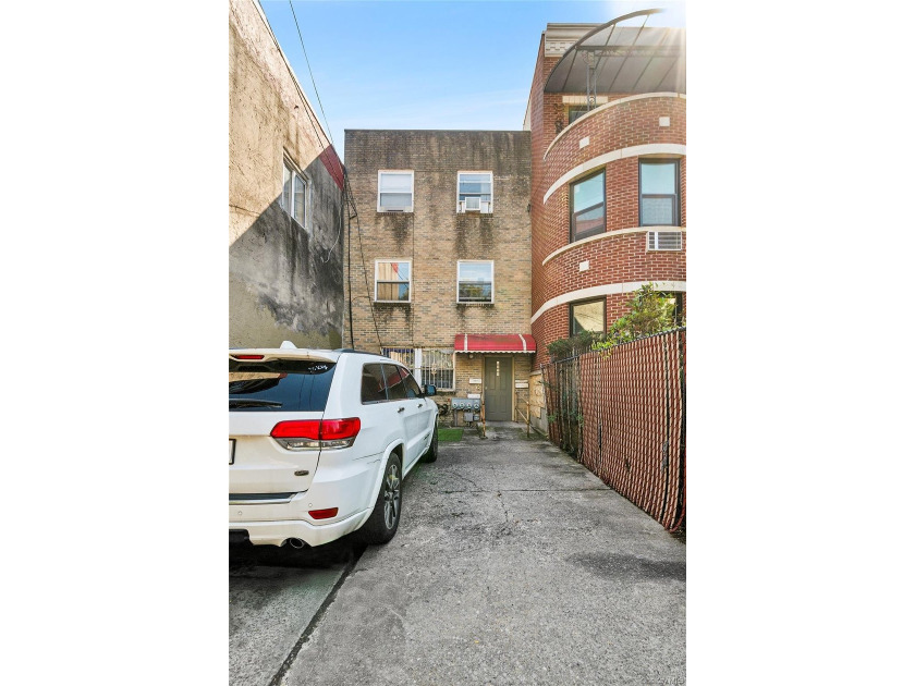 Three-Family Residence - Exceptional Investment Opportunity This - photo 2