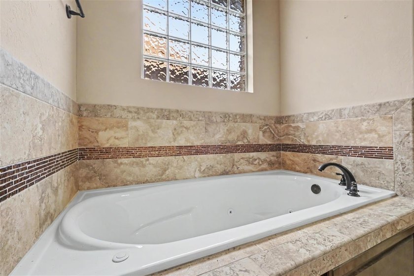 Welcome to this absolutely stunning 4-bedroom home in the - photo 26