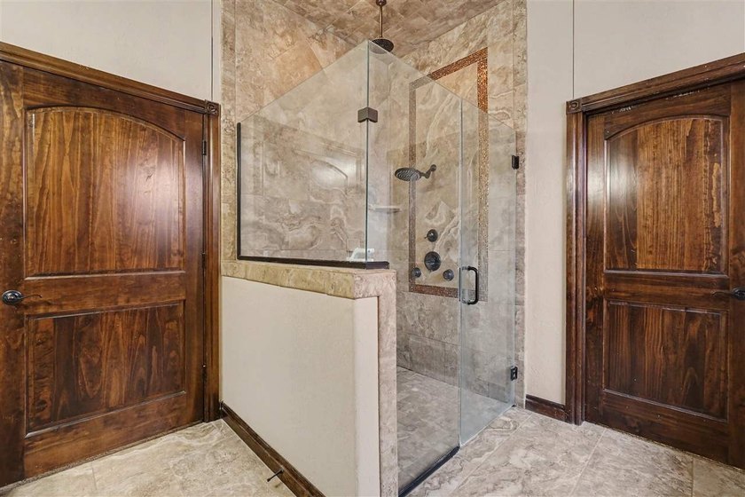Welcome to this absolutely stunning 4-bedroom home in the - photo 28