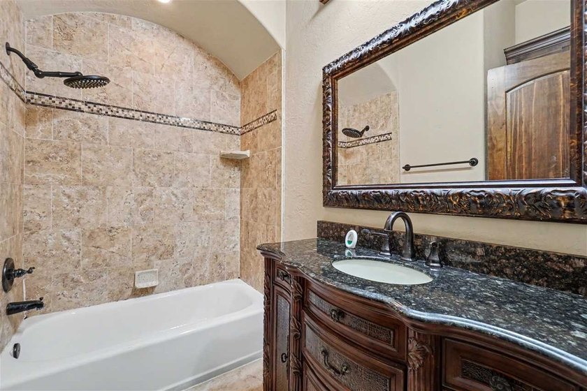 Welcome to this absolutely stunning 4-bedroom home in the - photo 32