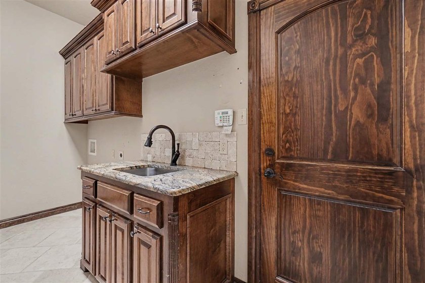 Welcome to this absolutely stunning 4-bedroom home in the - photo 39