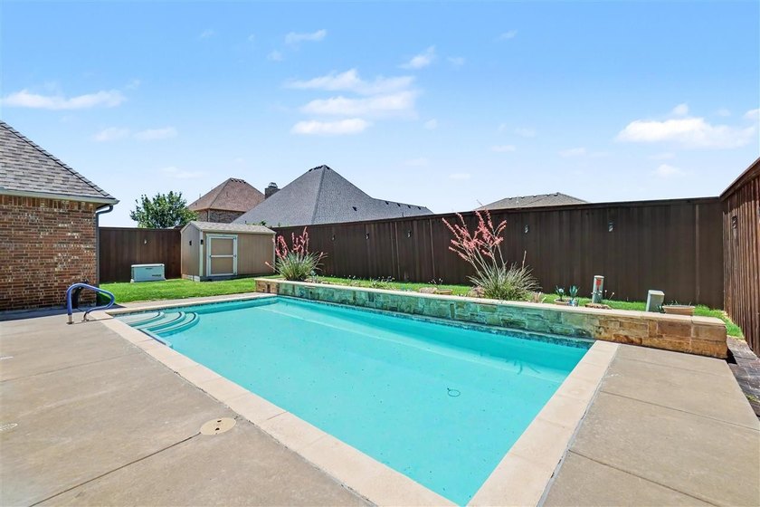 Welcome to this absolutely stunning 4-bedroom home in the - photo 44