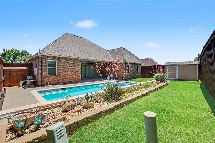 Welcome to this absolutely stunning 4-bedroom home in the - photo 46