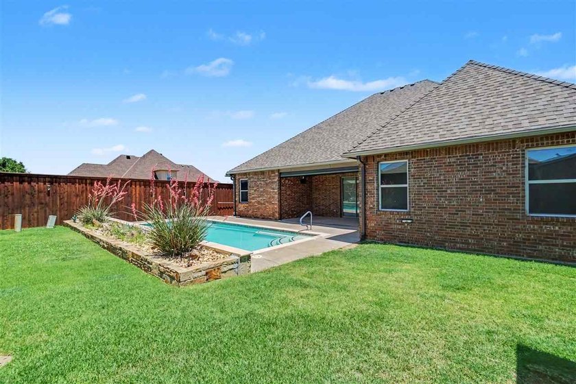 Welcome to this absolutely stunning 4-bedroom home in the - photo 47
