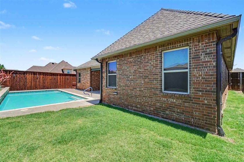 Welcome to this absolutely stunning 4-bedroom home in the - photo 48
