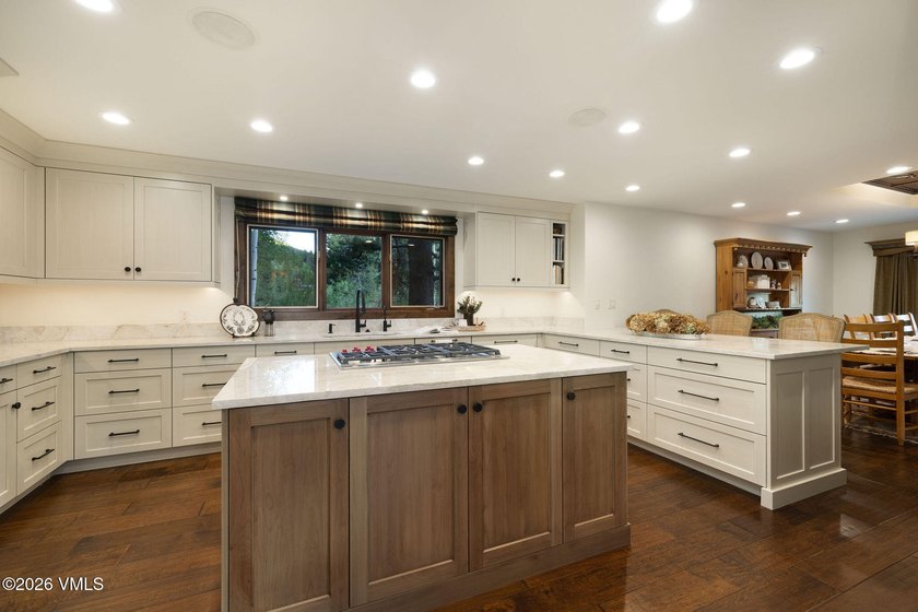 Strategically positioned along the banks of Gore Creek, this - photo 9