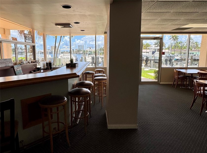 Enjoy direct water views from every room of the pool, marina and - photo 18