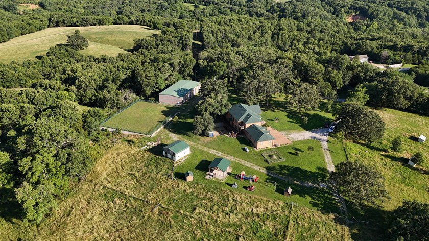 Welcome to a remarkable 310-acre estate just 8 minutes north of - photo 3