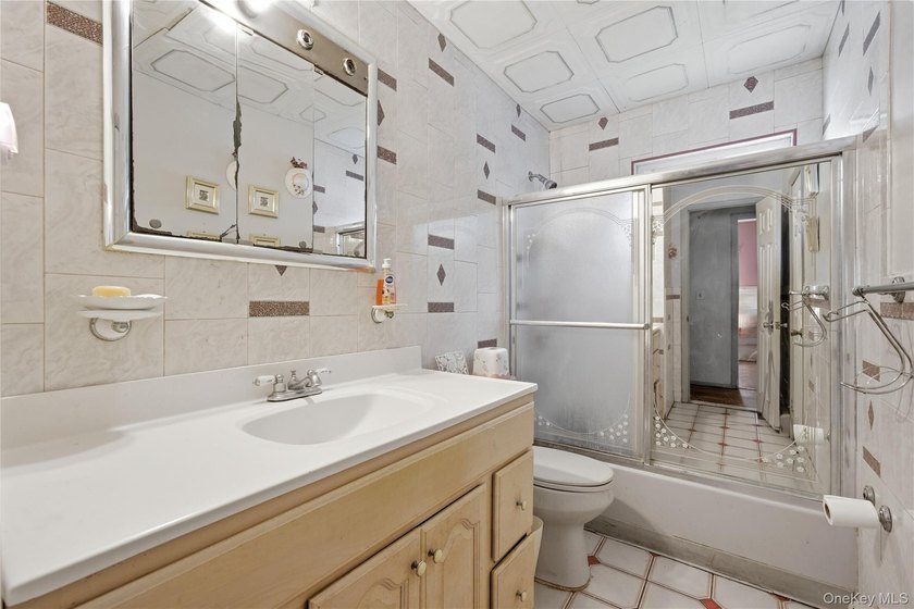 Welcome to this spacious hi-ranch in Bay Shore, offering endless - photo 12