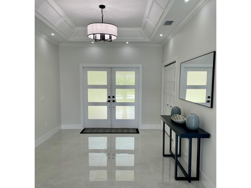 Welcome to this reimagined 4-bedroom, 3-bathroom, pool home in - photo 8