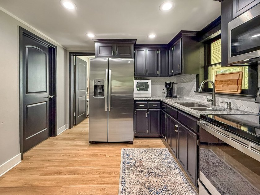 Motivated Seller! Escape to the perfect blend of rustic charm - photo 10