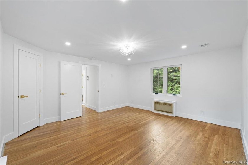 Welcome to this beautifully renovated Tudor, ideally located in - photo 32