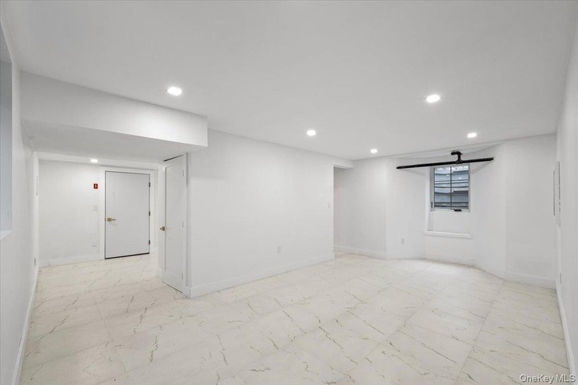 Welcome to this beautifully renovated Tudor, ideally located in - photo 38