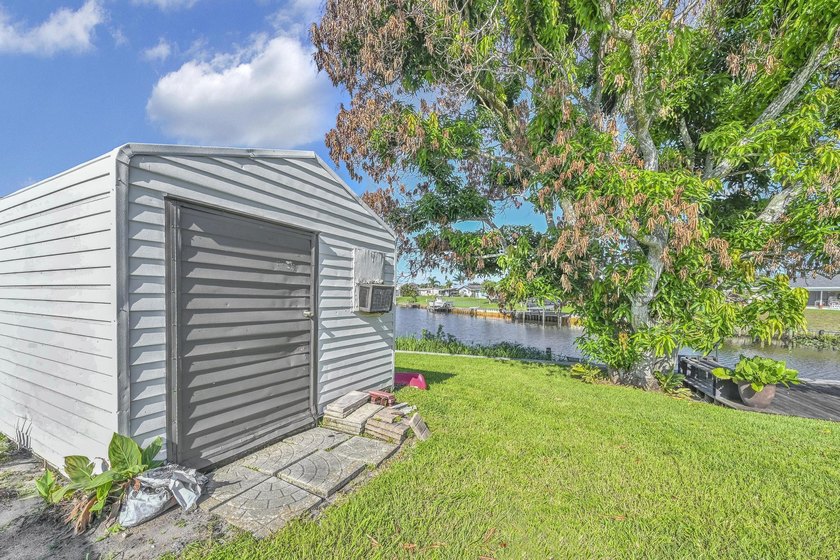 Welcome to this charming 3-bedroom, 2-bathroom single-family - photo 50