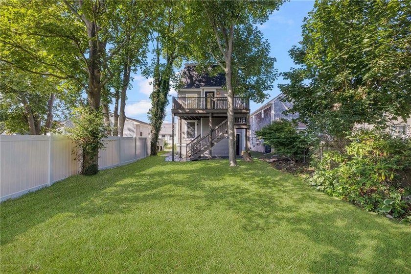 Thoughtfully renovated two-unit multi-family home with an - photo 2