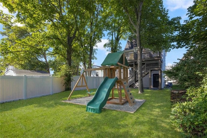 Thoughtfully renovated two-unit multi-family home with an - photo 3