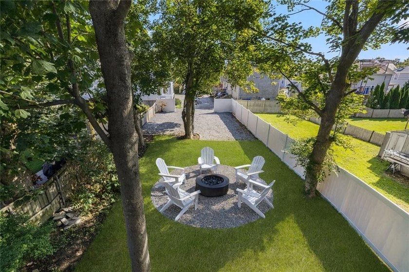 Thoughtfully renovated two-unit multi-family home with an - photo 5