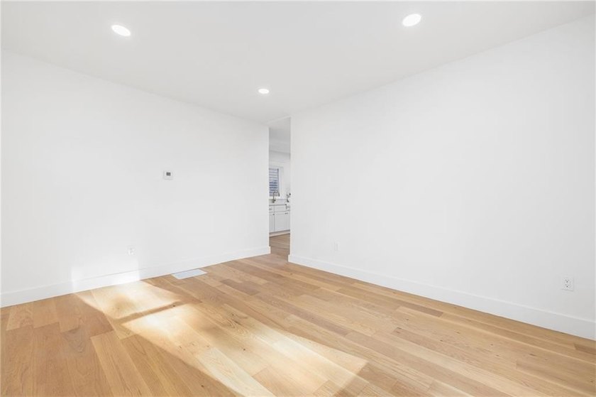 Thoughtfully renovated two-unit multi-family home with an - photo 9