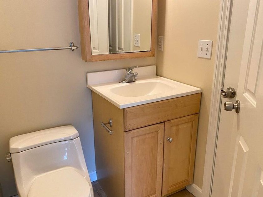 Three-level condominium offering space, flexibility, and a prime - photo 12