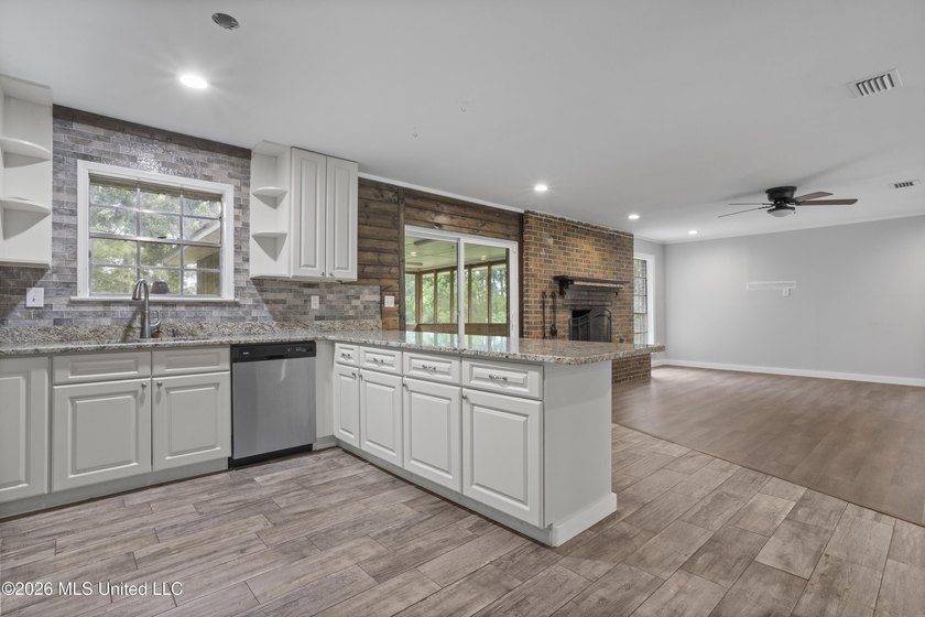 Enjoy waterfront living in this 3-bedroom, 2-bath home located - photo 12