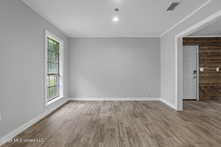 Enjoy waterfront living in this 3-bedroom, 2-bath home located - photo 15