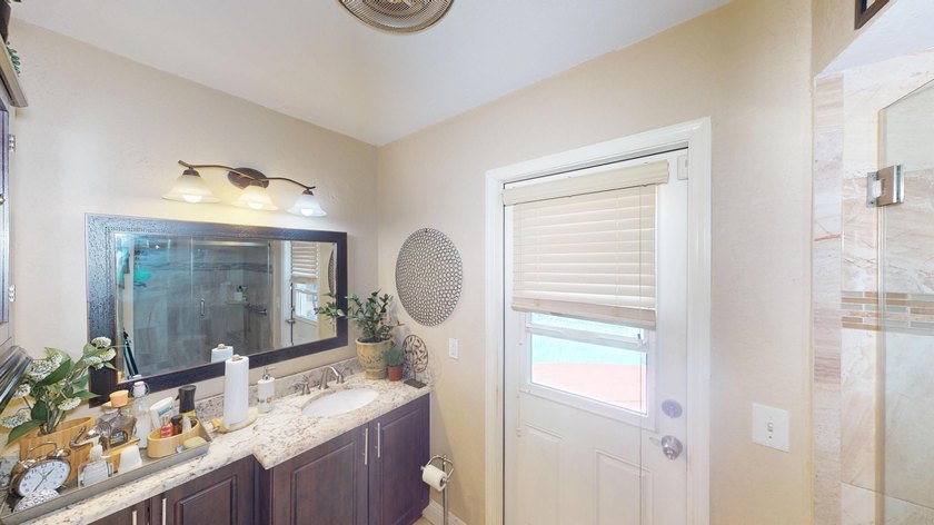 Welcome to this beautifully refreshed pool home located in the - photo 24