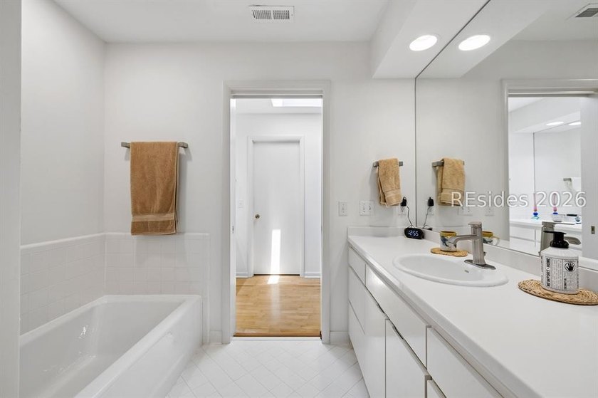 Pristine, thoughtfully updated residence with Sams Point Pond - photo 36