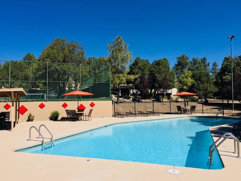 Just steps from the pool, pickleball courts and lakes, this cozy - photo 24