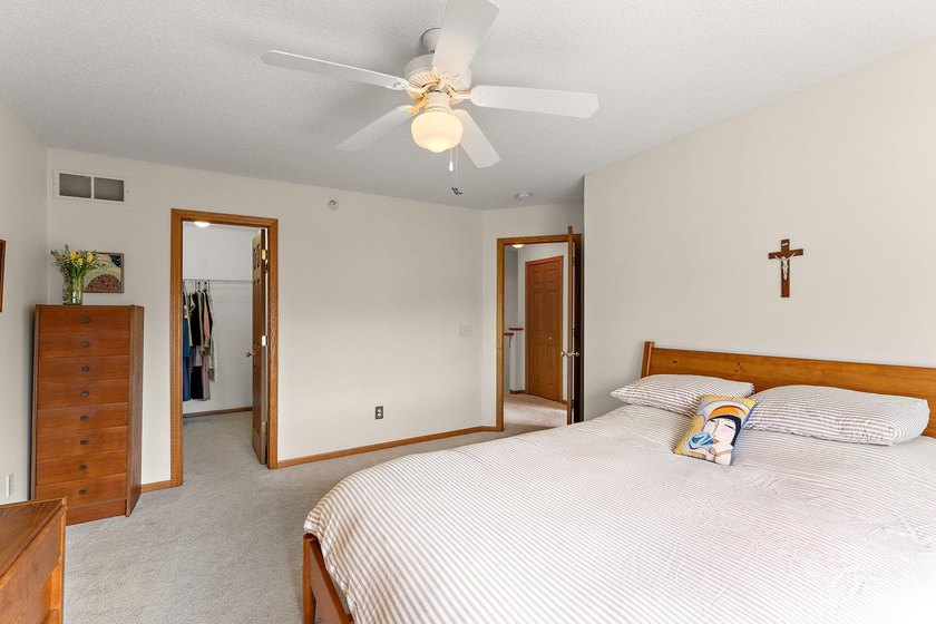 This home offers an open main level defined by natural light - photo 16