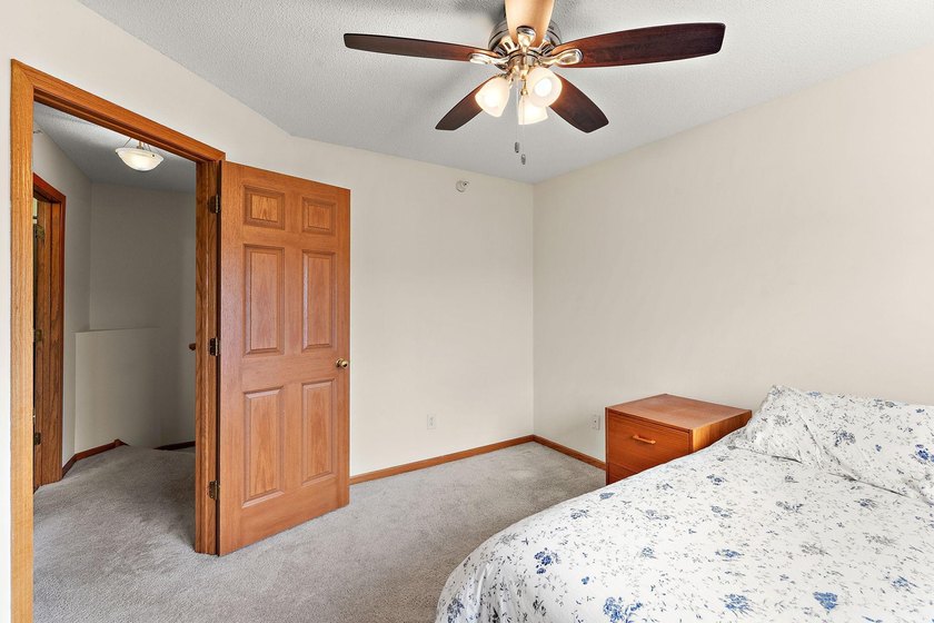 This home offers an open main level defined by natural light - photo 19