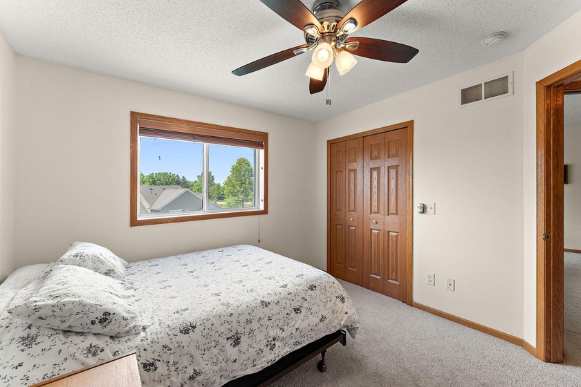 This home offers an open main level defined by natural light - photo 20