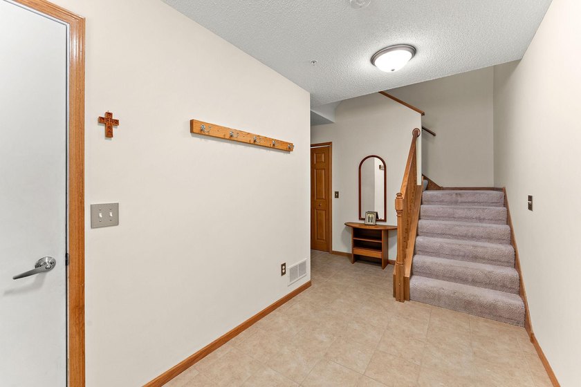 This home offers an open main level defined by natural light - photo 21