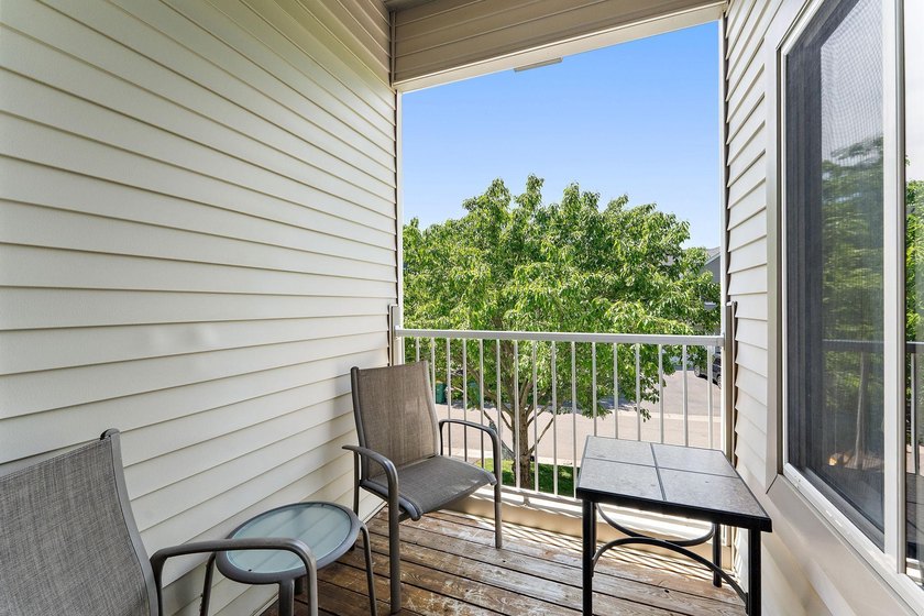 This home offers an open main level defined by natural light - photo 24
