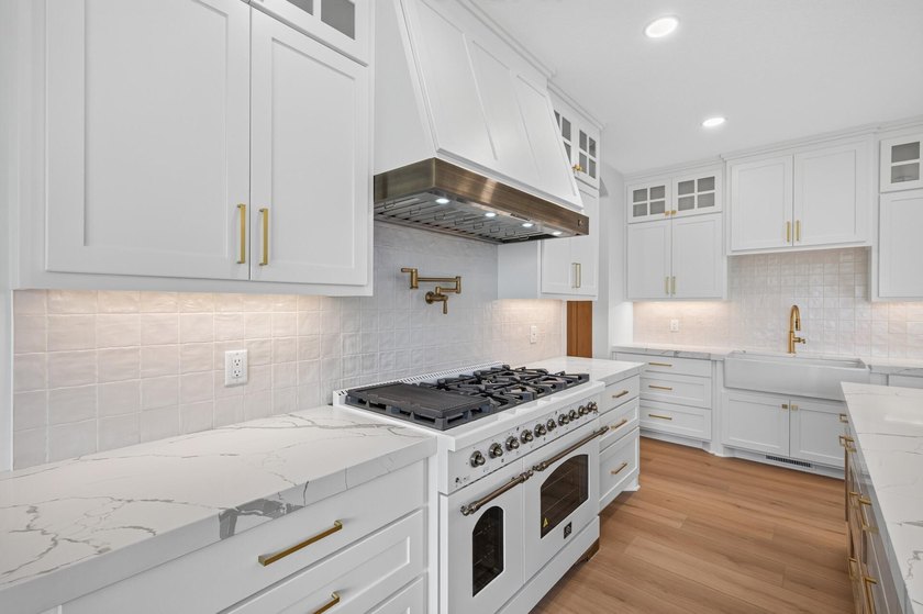 Experience luxury living in this custom-built two-story home by - photo 9