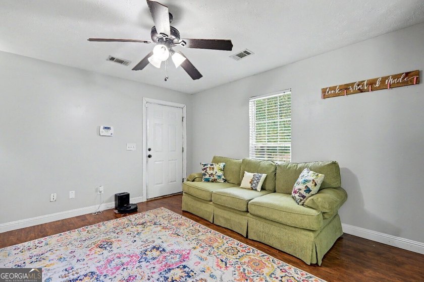 Welcome home to this charming ranch-style property offering the - photo 22