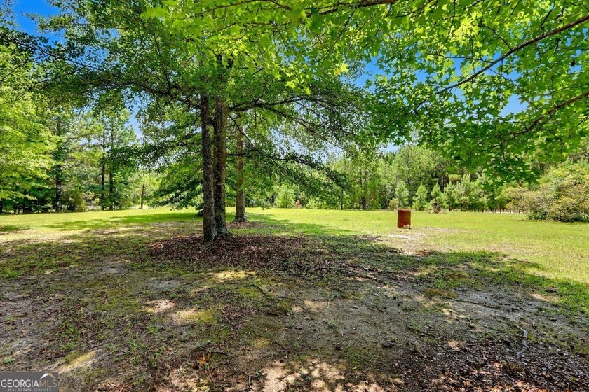 Welcome home to this charming ranch-style property offering the - photo 41