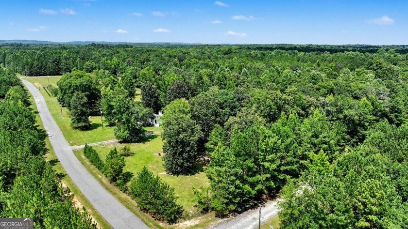 Welcome home to this charming ranch-style property offering the - photo 44