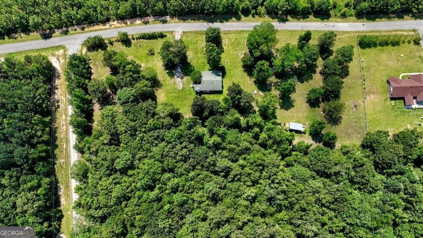 Welcome home to this charming ranch-style property offering the - photo 49