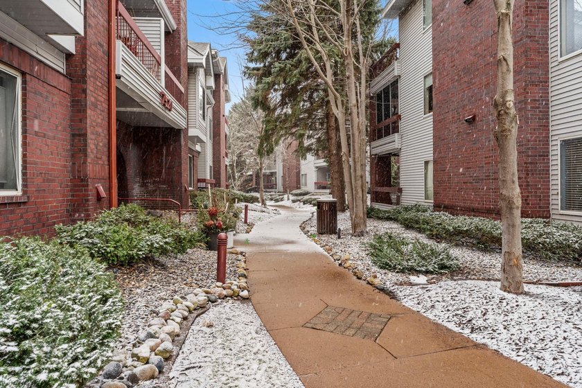 Experience maintenance-free living in this stunning, west-facing - photo 25