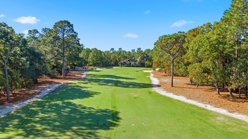 Set on the 11th fairway of The Reserve, 681 Reserve Drive is an - photo 4